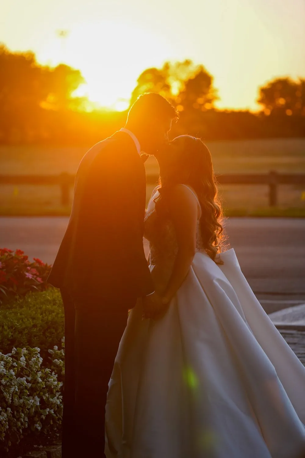 Bride and groom share a kiss at golden hour — Maximus Visions wedding photography, New Jersey & New York City