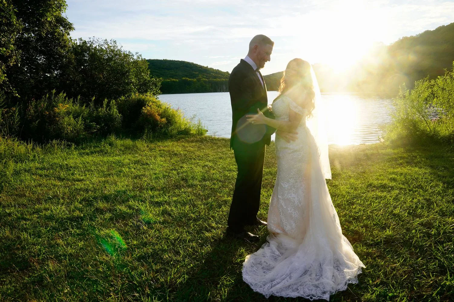 Bride and groom by a lake in golden-hour light — Maximus Visions wedding photography, New Jersey & New York City