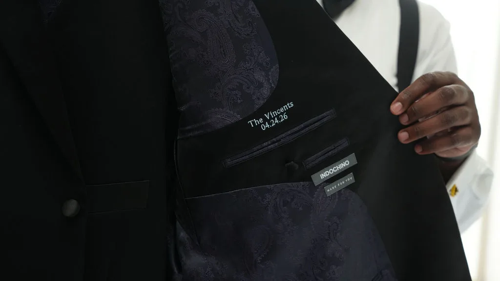 Custom tuxedo lining embroidered 'The Vincents · 04.24.26' — one-of-a-kind groom detail, New Jersey black-tie wedding