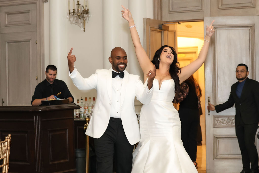 Bride and groom's grand entrance into the ballroom reception at Park Chateau Estate, NJ