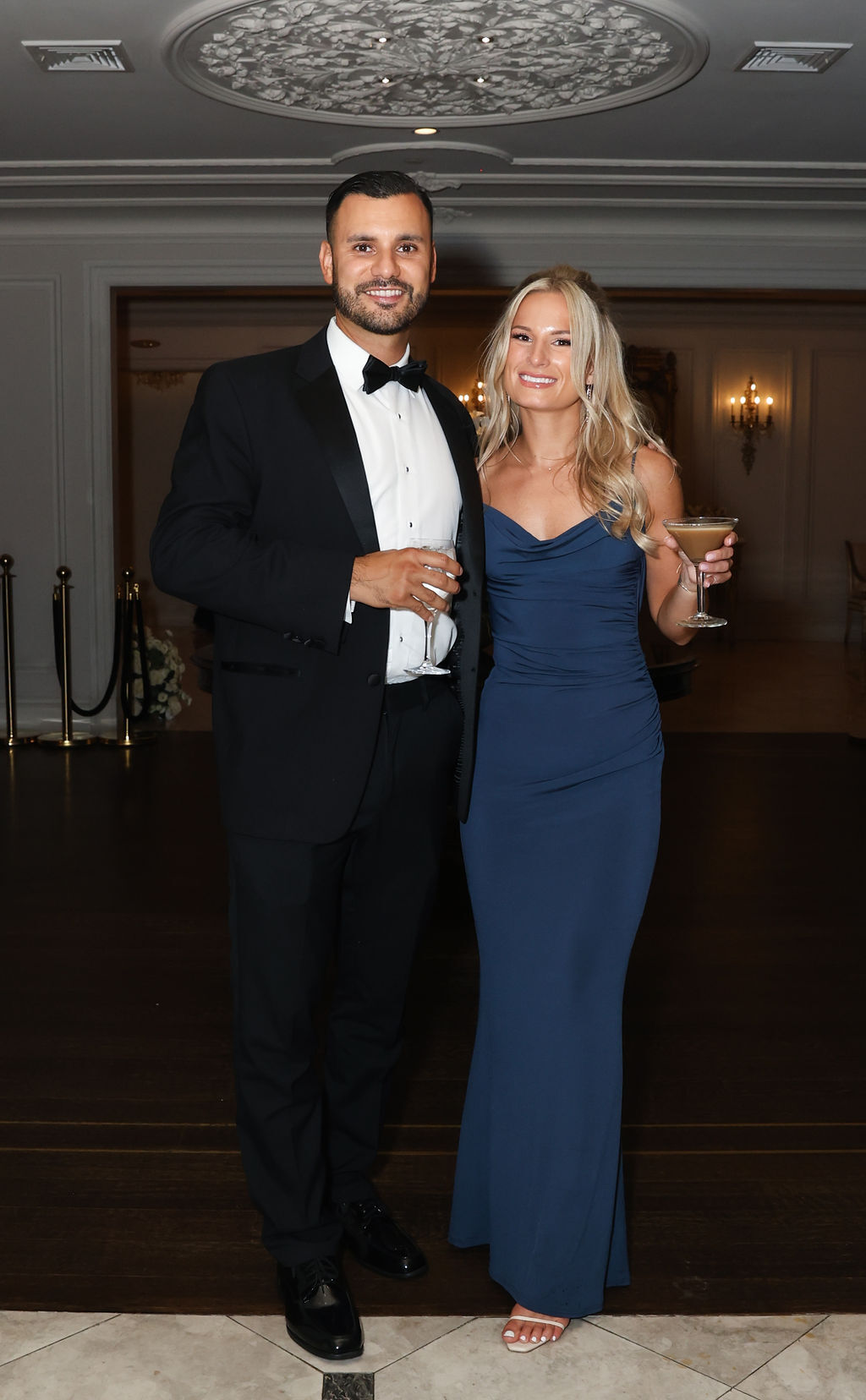 Couple in formal cocktail attire at the Park Chateau Estate wedding reception, NJ